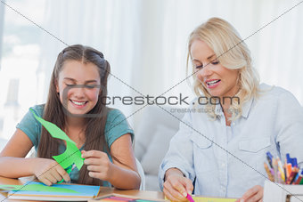 Mother and daughter doing arts and crafts together