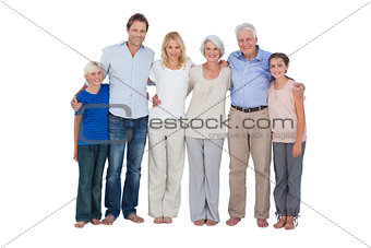 Family standing against a white background