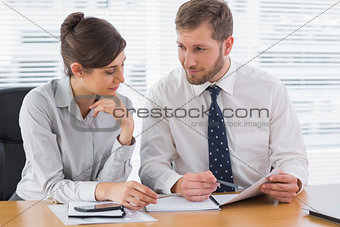 Business people working on documents