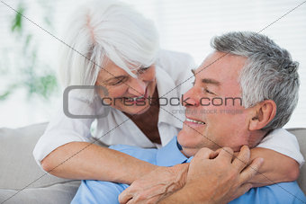 Woman hugging husband