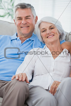 Couple relaxing together on a couch