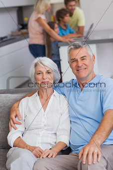 Portrait of a couple sitting on couch