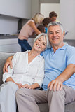 Elderly couple sitting on the couch