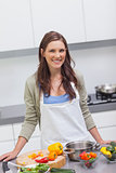 Attractive woman cooking vegetables