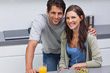 Couple sitting in the kitchen
