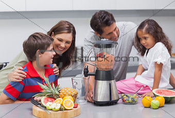 Family using a blender