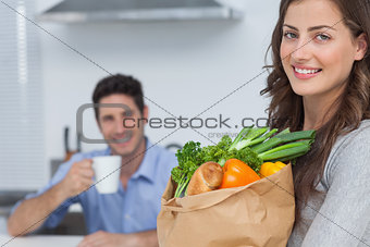 Woman with groceries bag