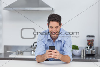 Man texting with his smartphone
