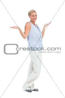 Happy woman standing with hands up
