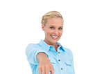 Blonde woman pointing with finger