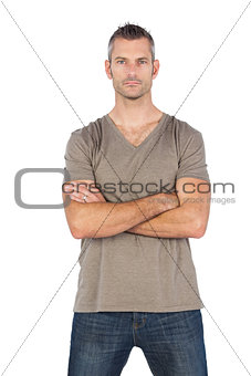 Serious man with arms crossed