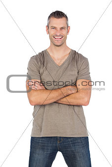 Cheerful man with arms crossed