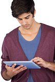 Young man using tablet pc