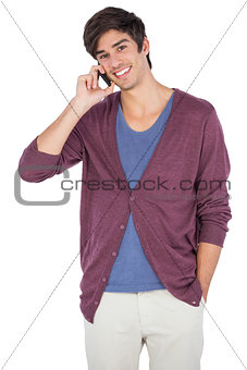 Smiling man speaking on the phone