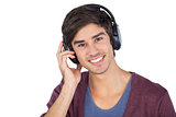 Smiling man listening music