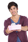 Young man offering a gift