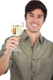 Man holding white wine glass