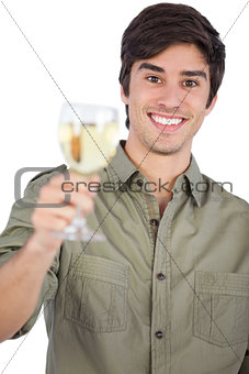 Smiling young man with wine glass