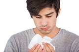 Sick man using handkerchief