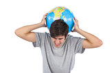 Man suffering because of a globe