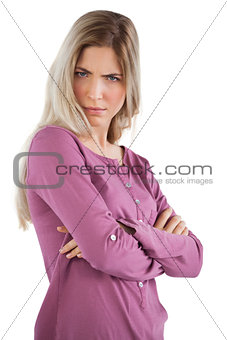 Mysterious woman with arms crossed