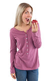 Young woman ready to eat apple
