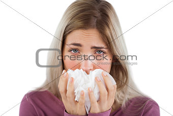 Blonde woman using handkerchief