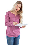 Happy woman using tablet pc
