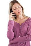 Worried woman talking on the phone
