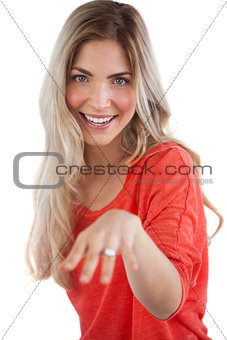 Blonde young woman with engagement ring