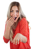 Astonished woman with engagement ring