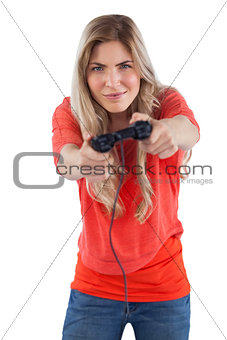 Concentrated woman playing video games