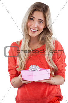 Blonde woman receiving a gift