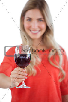 Young woman with red wine glass