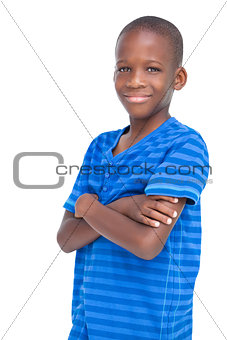 Smiling boy with arms crossed