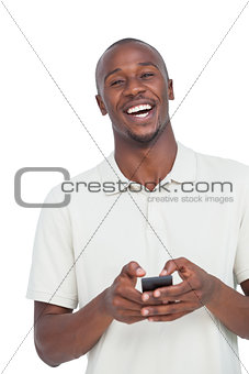 Laughing man with mobile phone