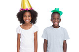Kids wearing party hats