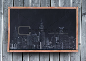 Drawing of a city on a blackboard