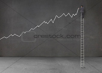 Businessman standing on a giant ladder