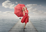 Beautiful woman holding umbrella