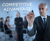 Sophisticated businessman writing competitive advantage
