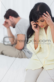 Woman calling someone during dispute