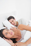 Woman annoyed that her partner snoring