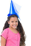 Little girl wearing blue hat for a party
