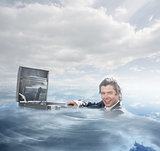 Businessman swimming in the water