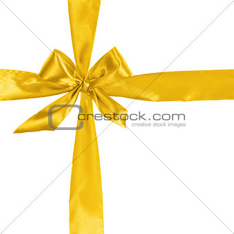 cross from yellow ribbon with bow