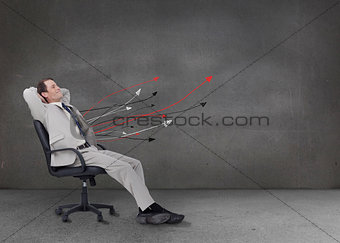 Attractive businessman relaxing on his chair