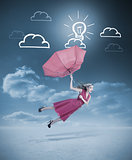 Glamour woman flying with a red umbrella