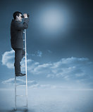 Businessman standing on ladder over clouds