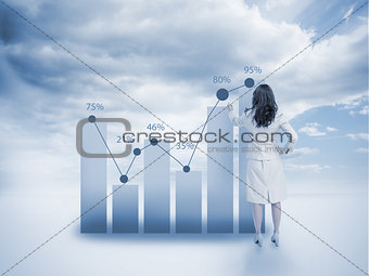 Businesswoman drawing a chart